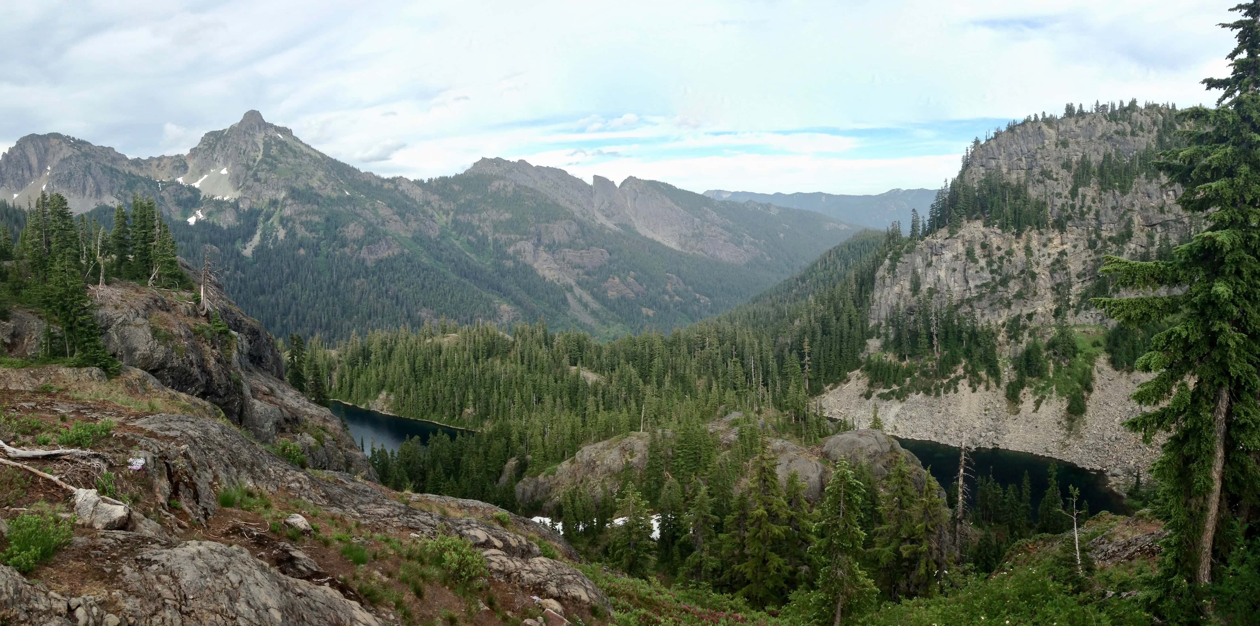 Rampart Ridge's eastern edge surveys Rachel Lake, Box Canyon, and Box Ridge's Nobox, Hibox, and Lobox mountains. Rampart Lakes Trail, July 18, 2014.